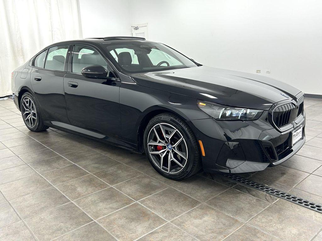 used 2024 BMW i5 car, priced at $55,995