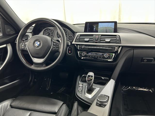 used 2018 BMW 330 car, priced at $23,051