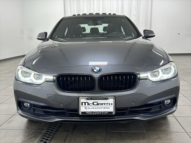 used 2018 BMW 330 car, priced at $23,051