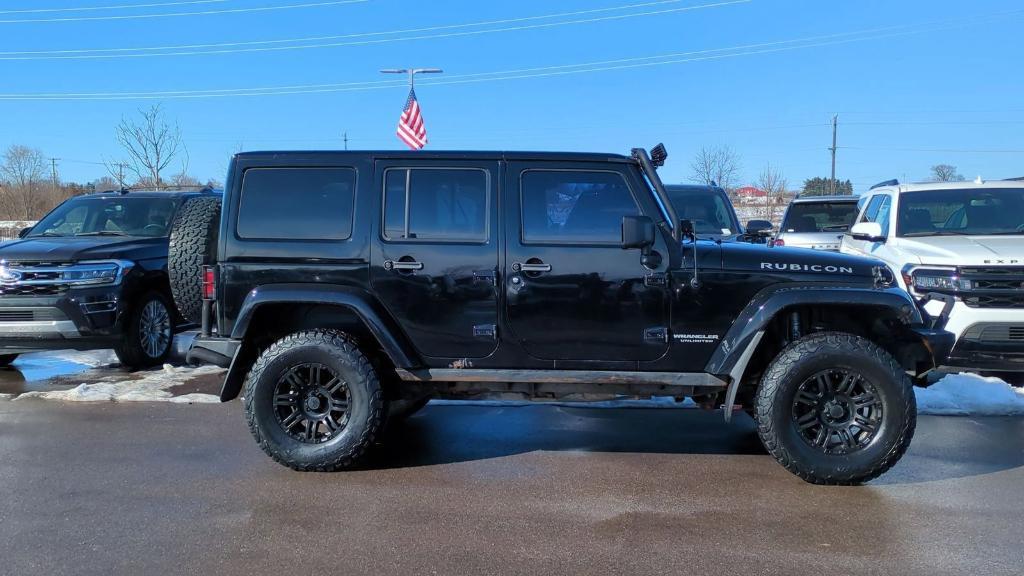 used 2014 Jeep Wrangler Unlimited car, priced at $20,495