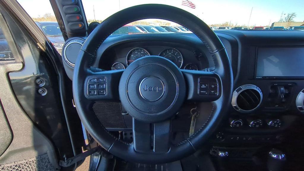 used 2014 Jeep Wrangler Unlimited car, priced at $20,495