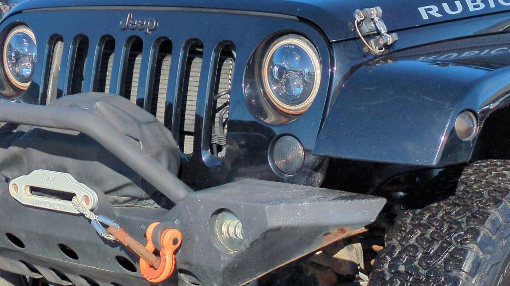 used 2014 Jeep Wrangler Unlimited car, priced at $20,495