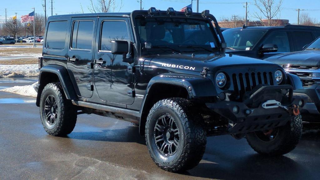 used 2014 Jeep Wrangler Unlimited car, priced at $20,495