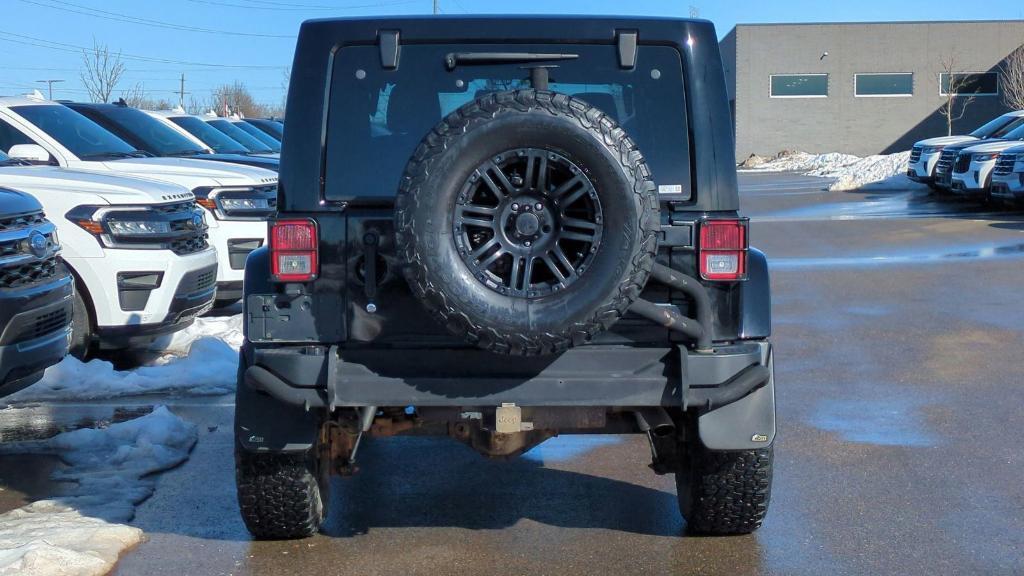 used 2014 Jeep Wrangler Unlimited car, priced at $20,495