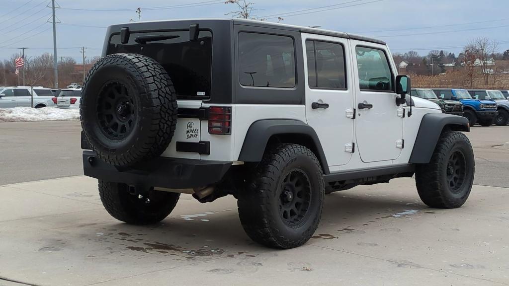 used 2018 Jeep Wrangler JK Unlimited car, priced at $16,495