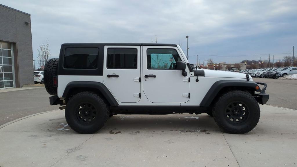 used 2018 Jeep Wrangler JK Unlimited car, priced at $16,495