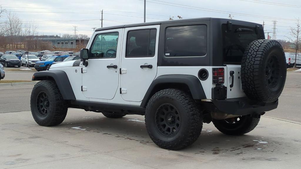 used 2018 Jeep Wrangler JK Unlimited car, priced at $16,495