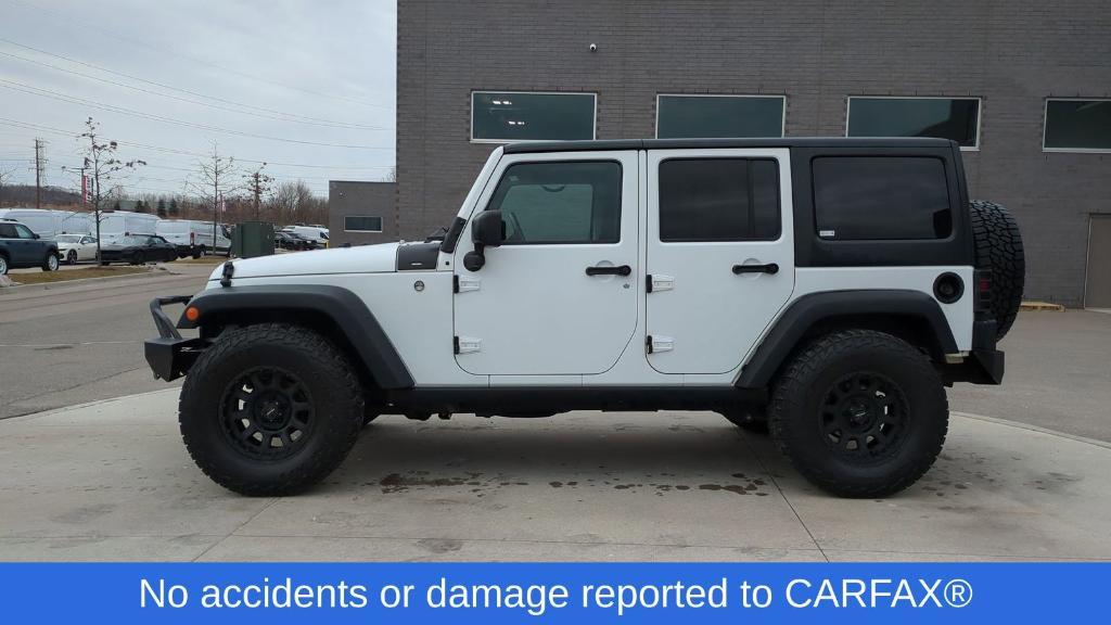 used 2018 Jeep Wrangler JK Unlimited car, priced at $16,495