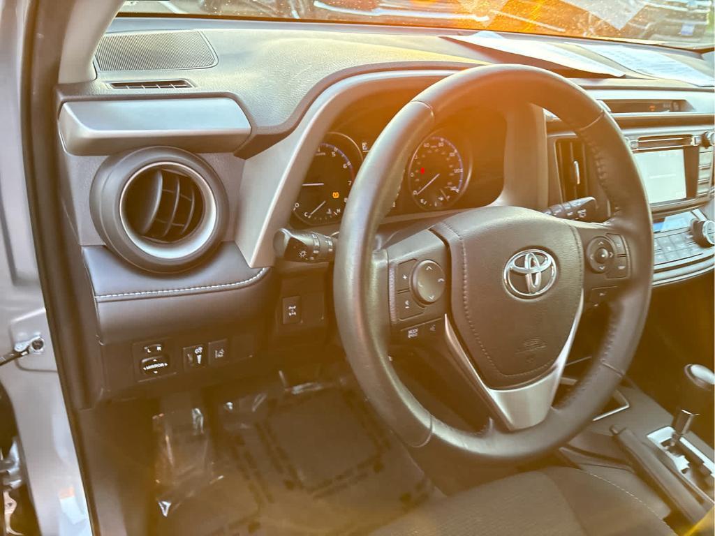 used 2018 Toyota RAV4 car, priced at $15,935