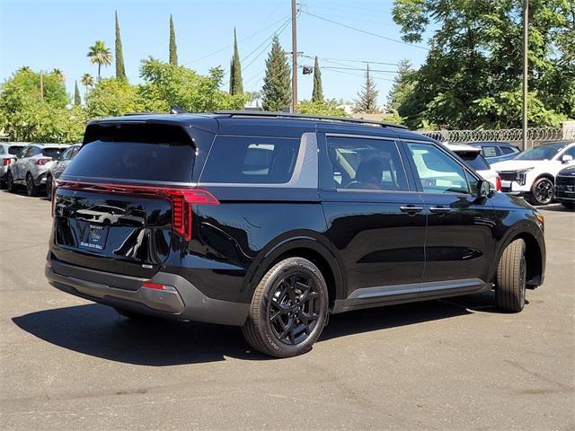 new 2025 Kia Carnival Hybrid car, priced at $51,454
