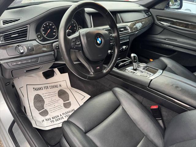 used 2015 BMW 750 car, priced at $11,900