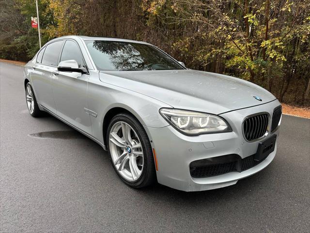 used 2015 BMW 750 car, priced at $13,495