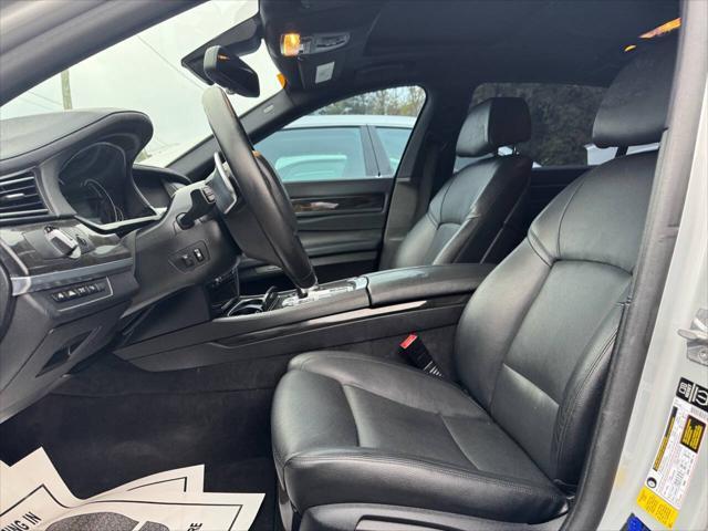 used 2015 BMW 750 car, priced at $11,900