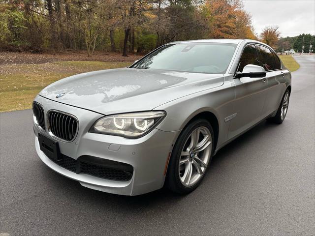 used 2015 BMW 750 car, priced at $13,495