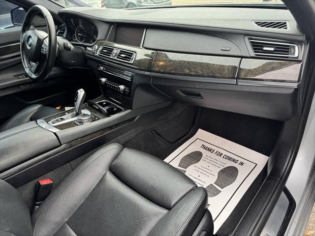 used 2015 BMW 750 car, priced at $11,900