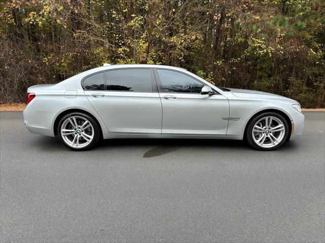 used 2015 BMW 750 car, priced at $13,495