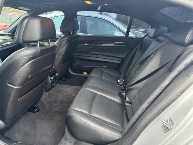 used 2015 BMW 750 car, priced at $11,900