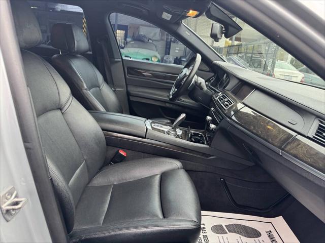 used 2015 BMW 750 car, priced at $11,900