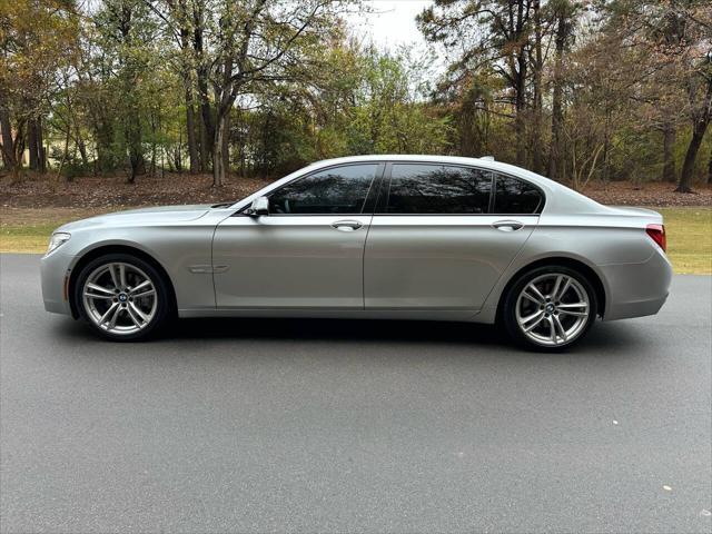 used 2015 BMW 750 car, priced at $13,495