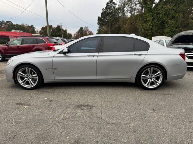 used 2015 BMW 750 car, priced at $11,900