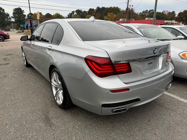 used 2015 BMW 750 car, priced at $11,900