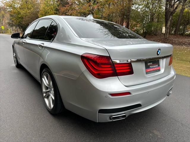 used 2015 BMW 750 car, priced at $13,495