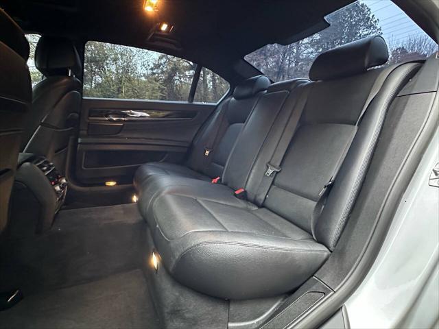 used 2015 BMW 750 car, priced at $13,495