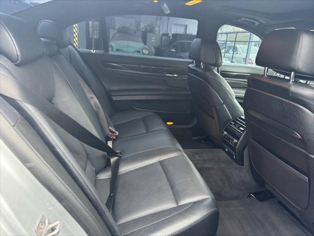 used 2015 BMW 750 car, priced at $11,900