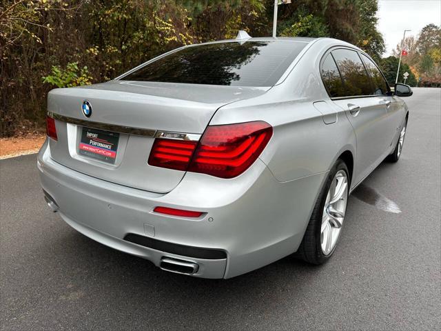 used 2015 BMW 750 car, priced at $13,495