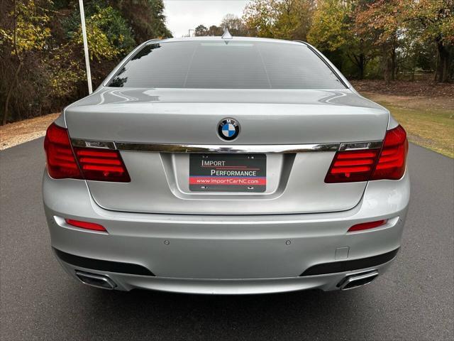 used 2015 BMW 750 car, priced at $13,495