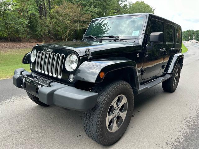 used 2016 Jeep Wrangler Unlimited car, priced at $21,995