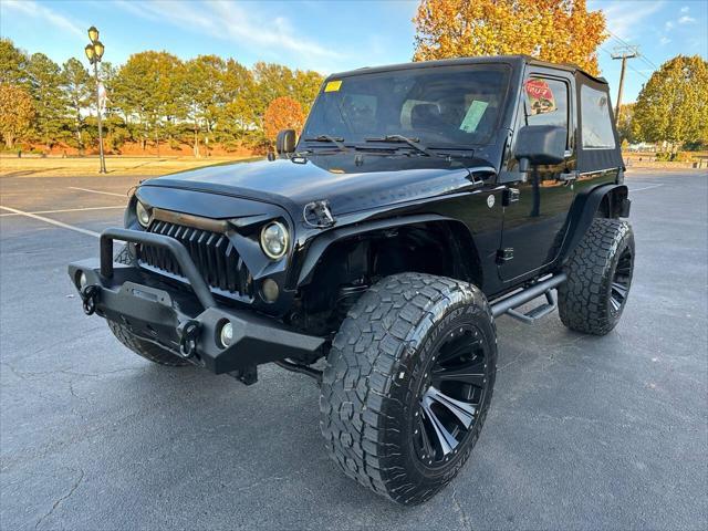 used 2013 Jeep Wrangler car, priced at $13,995