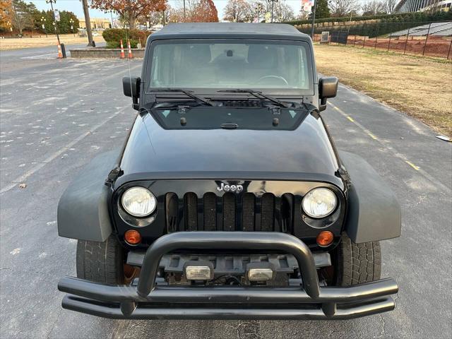 used 2011 Jeep Wrangler Unlimited car, priced at $12,495