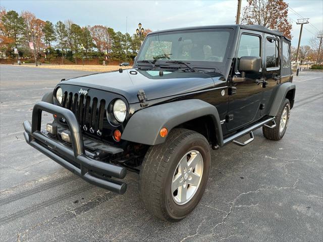 used 2011 Jeep Wrangler Unlimited car, priced at $12,495