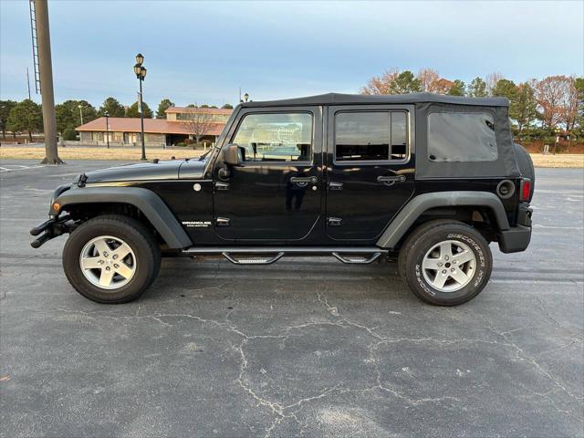 used 2011 Jeep Wrangler Unlimited car, priced at $12,495