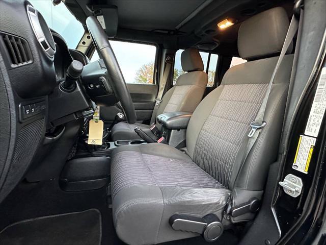 used 2011 Jeep Wrangler Unlimited car, priced at $12,495