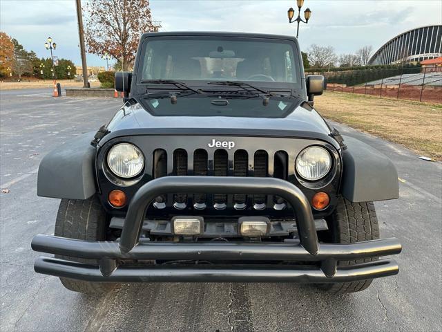 used 2011 Jeep Wrangler Unlimited car, priced at $12,495