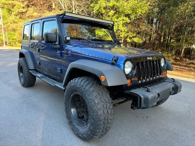 used 2010 Jeep Wrangler Unlimited car, priced at $17,500