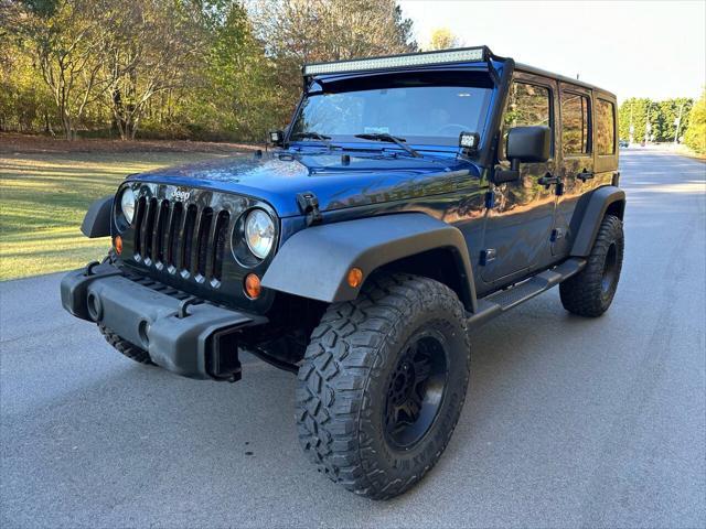 used 2010 Jeep Wrangler Unlimited car, priced at $17,500