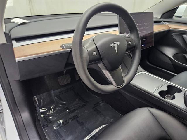 used 2022 Tesla Model 3 car, priced at $29,028