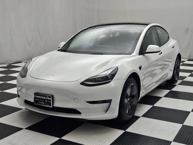 used 2022 Tesla Model 3 car, priced at $29,028