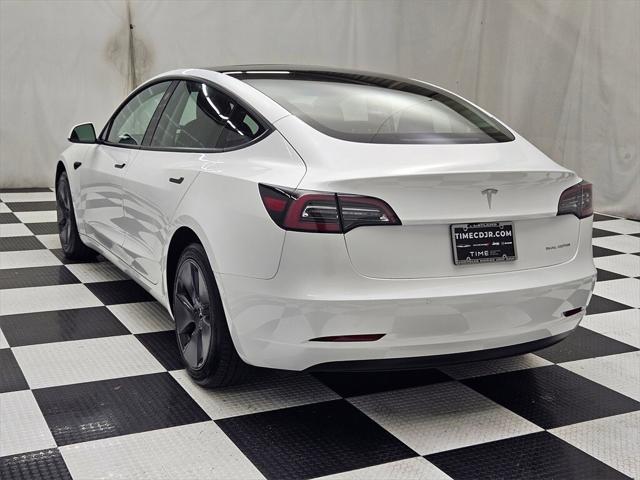 used 2022 Tesla Model 3 car, priced at $29,028