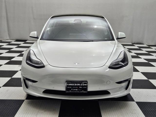 used 2022 Tesla Model 3 car, priced at $29,028