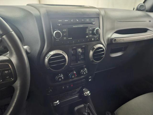 used 2014 Jeep Wrangler Unlimited car, priced at $21,877