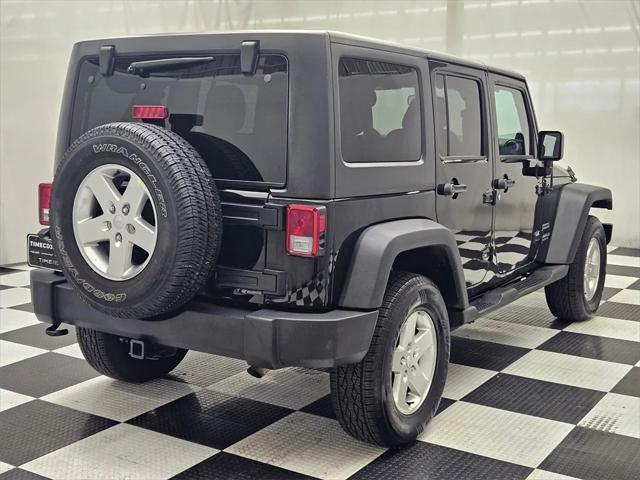 used 2014 Jeep Wrangler Unlimited car, priced at $21,877