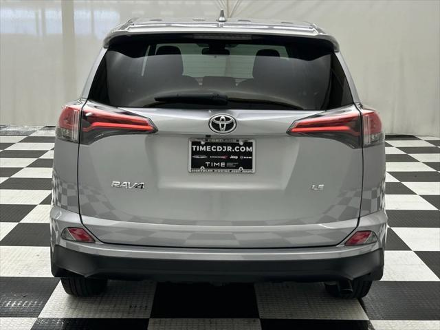 used 2018 Toyota RAV4 car, priced at $19,655