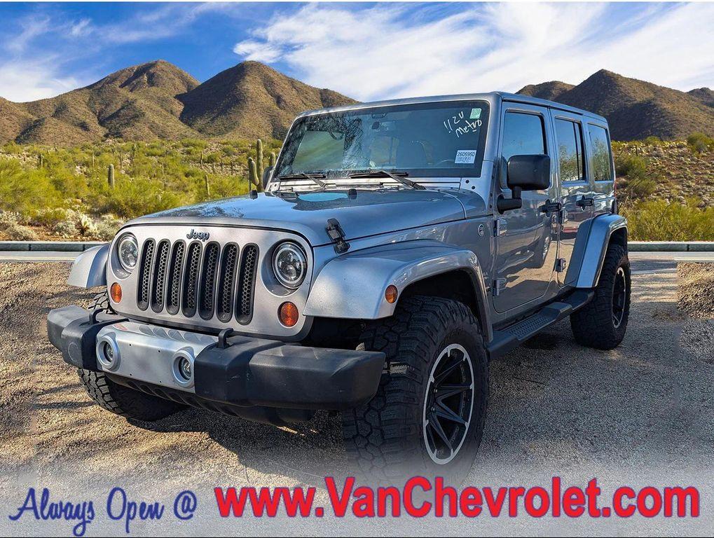 used 2013 Jeep Wrangler Unlimited car, priced at $12,890