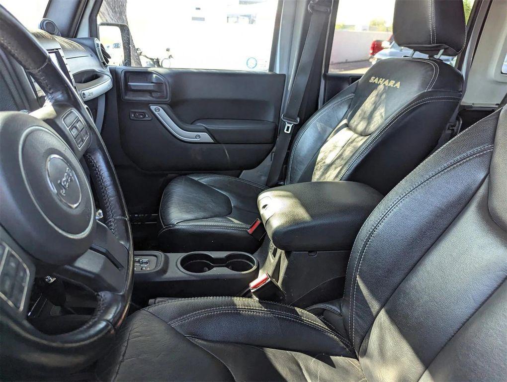 used 2013 Jeep Wrangler Unlimited car, priced at $12,890