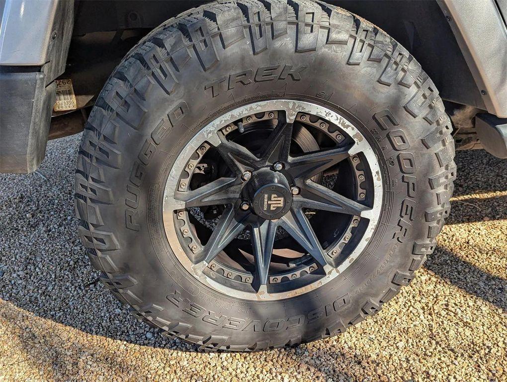 used 2013 Jeep Wrangler Unlimited car, priced at $12,890