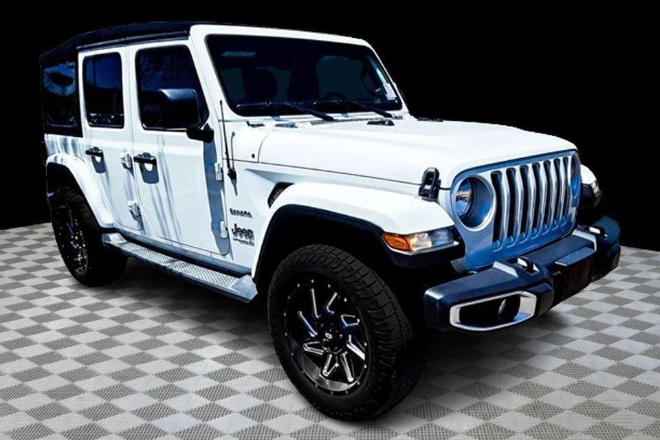 used 2019 Jeep Wrangler Unlimited car, priced at $30,494